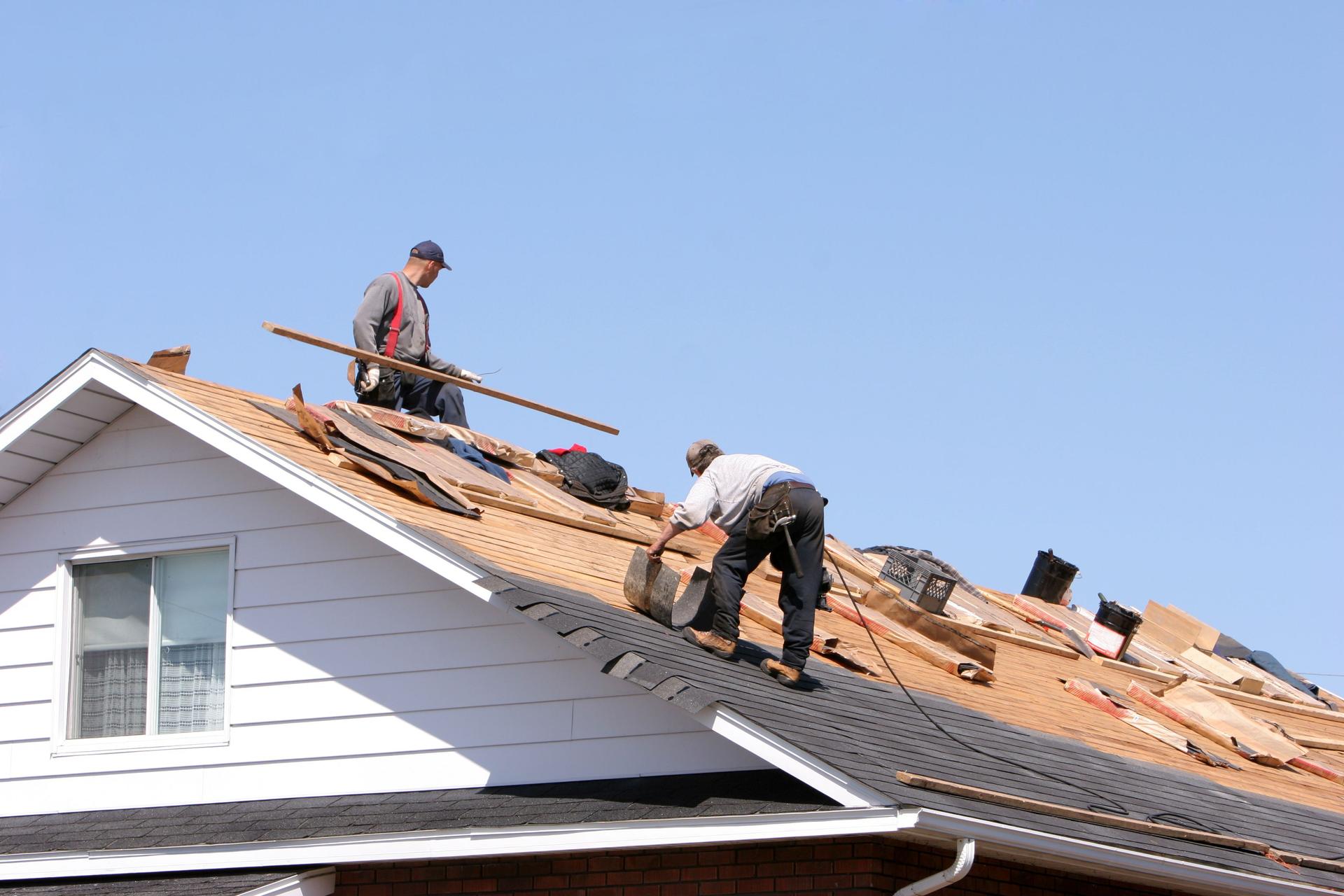 Hard working men on roof